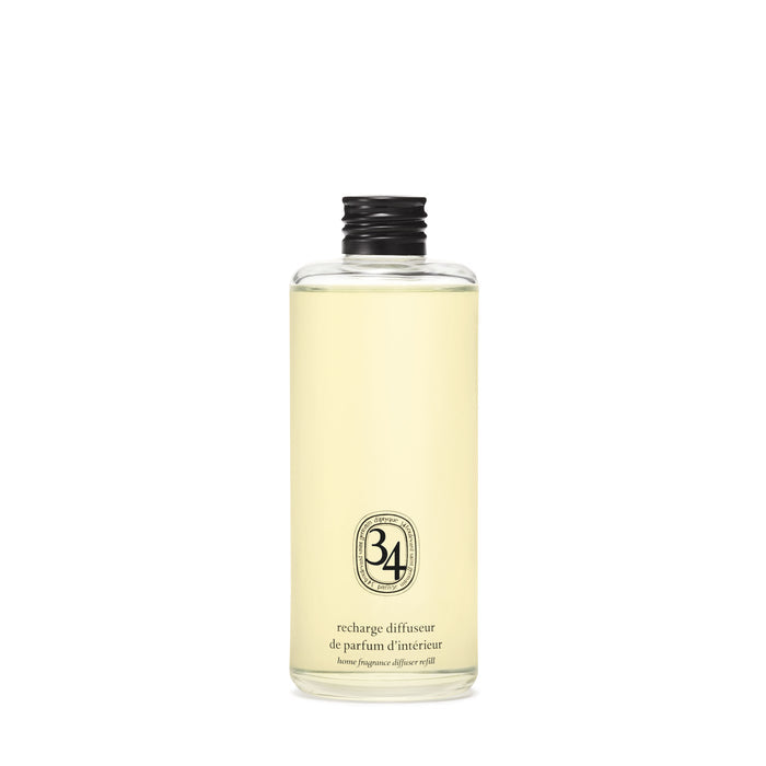 Image of an open Diptyque 34 Boulevard Saint-Germain​ Refill For Home Fragrance Diffuser