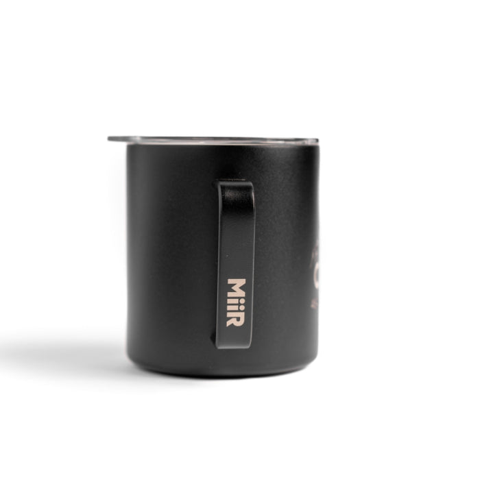 Black Metal Coffee mug with the julbo logo and coordinates of the Julbo HQ in France #color_julbo-camper-mug-12oz-black-mont-blanc