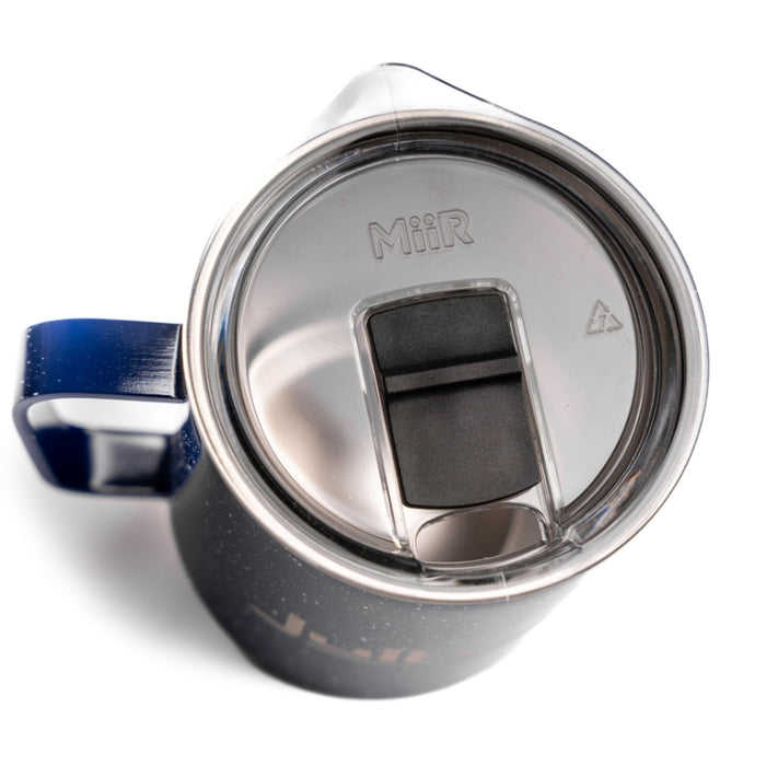 Blue Metal Coffee mug with the julbo logo and coordinates of the Julbo HQ in France #color_julbo-camper-mug-12oz-blue-enamel