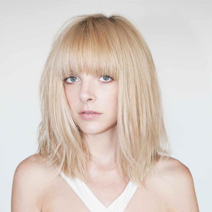 Model image of R+Co Bel Air Smoothing Shampoo and Anti-Oxidant Complex