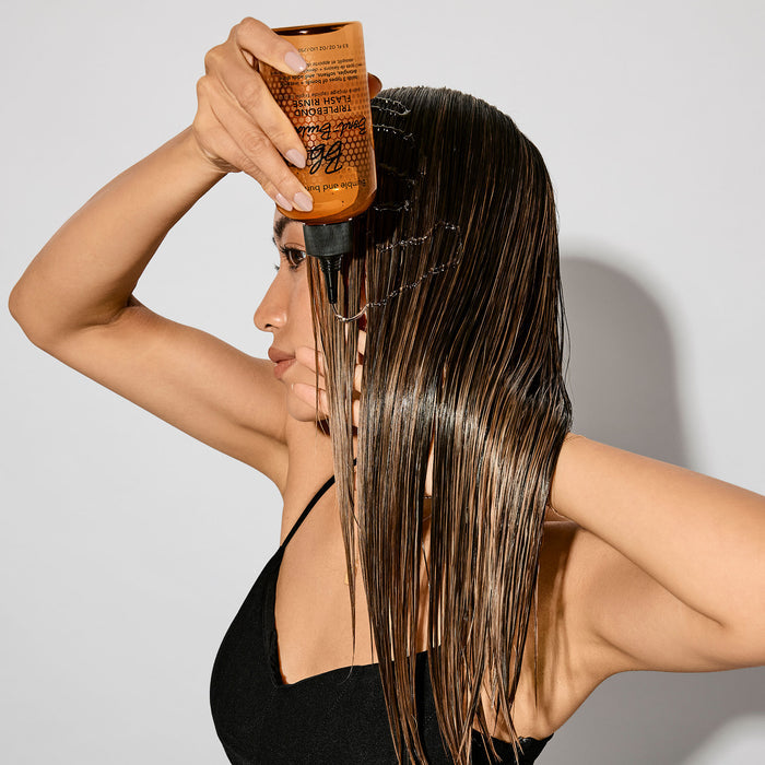 Model image of Bumble and Bumble Bond-Building TripleBond Flash Rinse for Damaged Hair variant: 1.8 fl oz