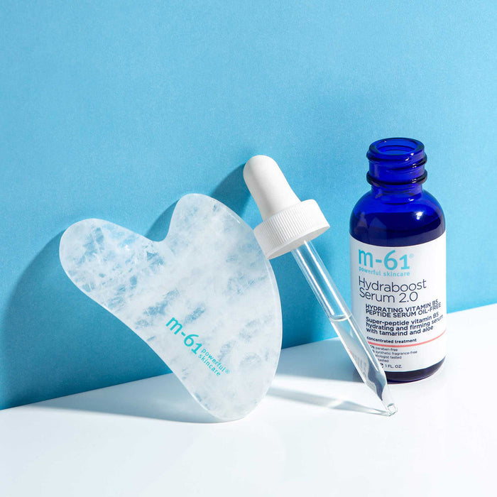 Lifestyle image of M-61 Clear Quartz Gua Sha