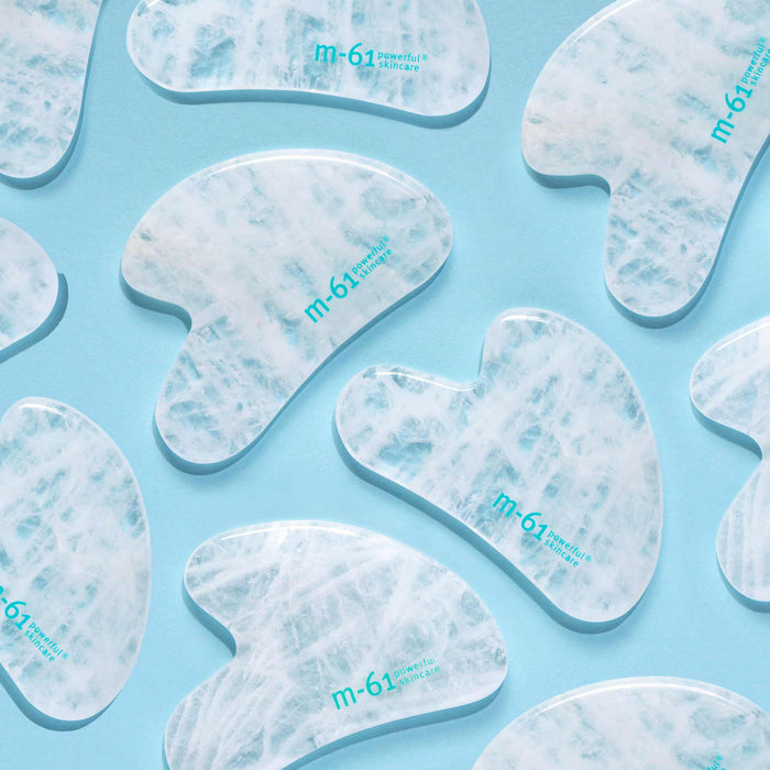 Lifestyle image of M-61 Clear Quartz Gua Sha