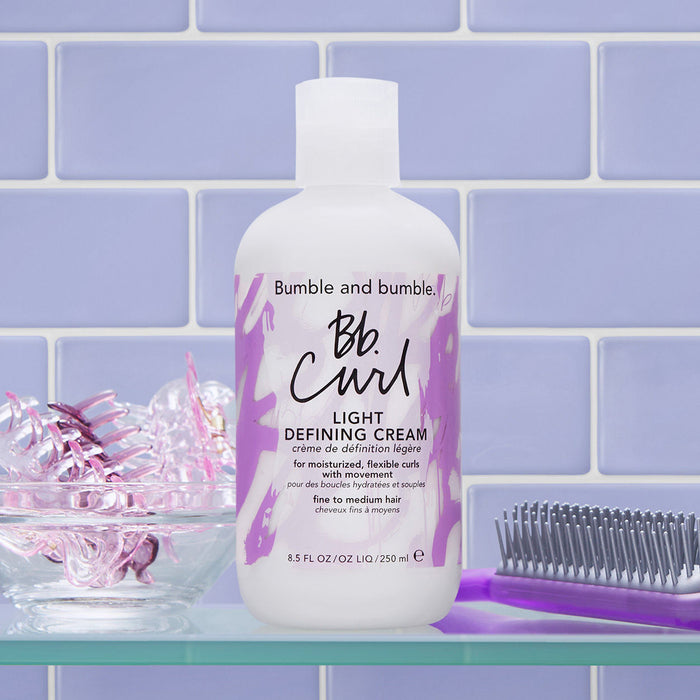 Lifestyle image of Bumble and Bumble Curl Light Defining Cream variant: 8.5 oz
