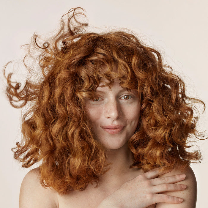 Model image of Virtue Curl Shampoo variant: 8 oz