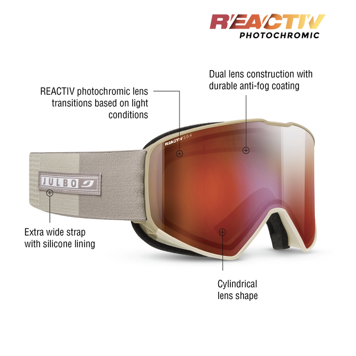 The Julbo Eyewear Cyrius X ski goggles feature a beige frame, photochromic anti-fog dual lens, extra wide silicone strap, and a sleek cylindrical shape for exceptional clarity and comfort on the slopes. #color_champagne-with-reactiv-0-4-high-contrast-lens