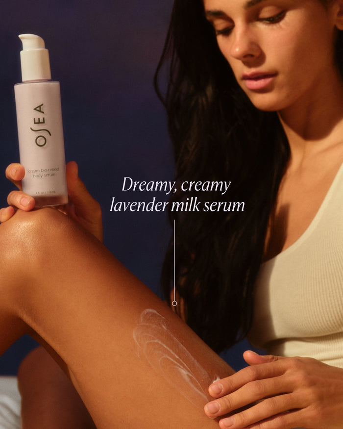 Dreamy, creamy lavender milk serum applied to skin to demonstrate silky texture