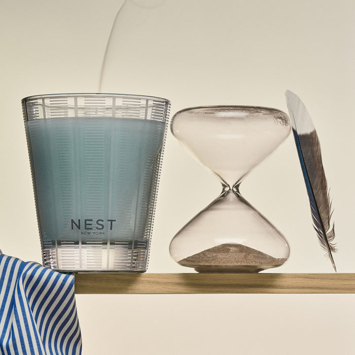 Lifestyle image of Nest Driftwood & Chamomile Candle variant: 8.1 oz (Classic)