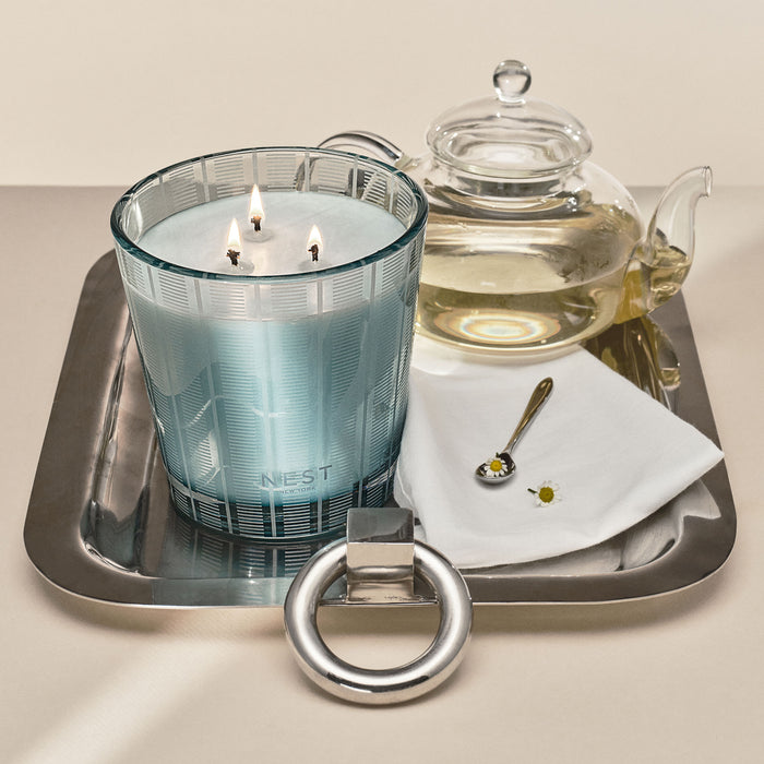 Lifestyle image of Nest Driftwood & Chamomile Candle variant: 21.1 oz (3-Wick)
