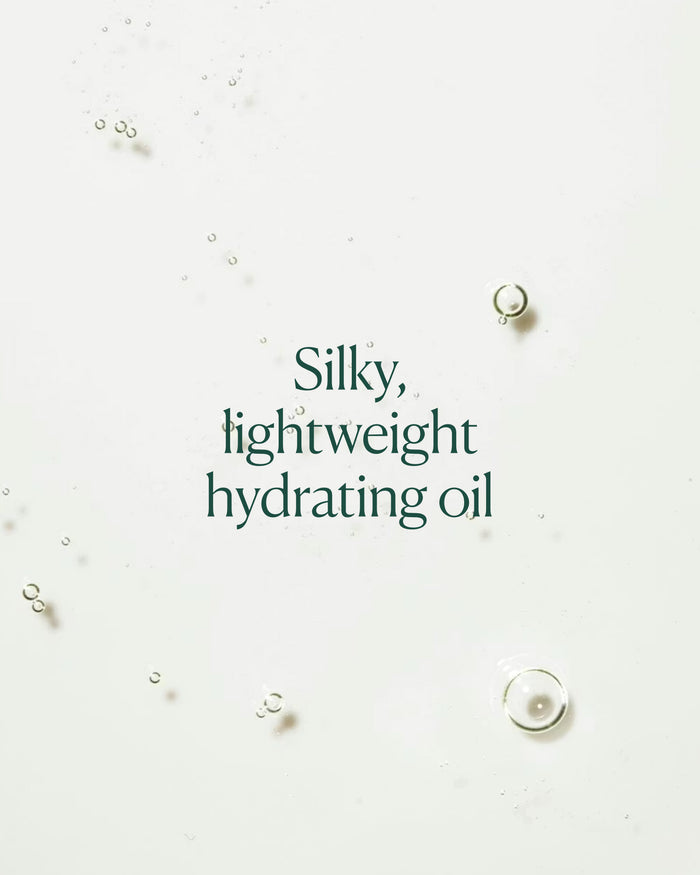 Close-up of silky oil texture with on-image text emphasizing lightweight hydration