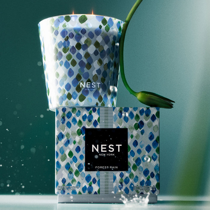 Lifestyle image of Nest Forest Rain Candle variant: 21.2 oz (Decorative 3-Wick)