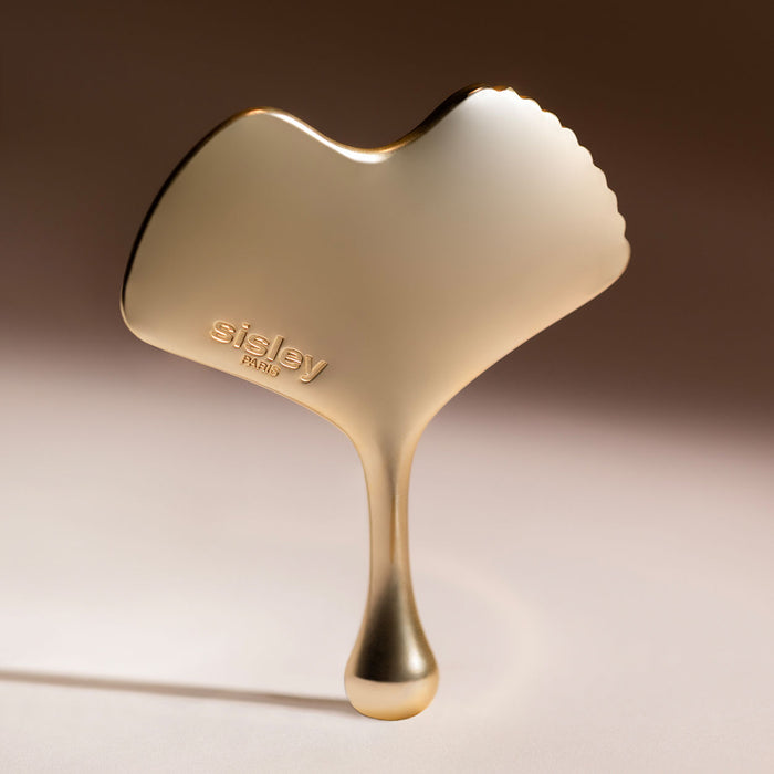 Lifestyle image of Sisley Paris Ginkgo Gua Sha Massage Tool