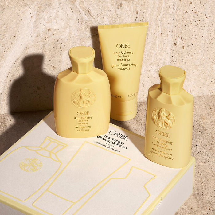 Lifestyle image of Oribe Hair Alchemy Strengthening Mini Travel Set