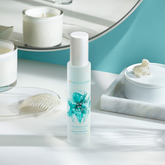 Lifestyle image of Moroccanoil Hair and Body Fragrance Mist variant: 3.4 fl oz