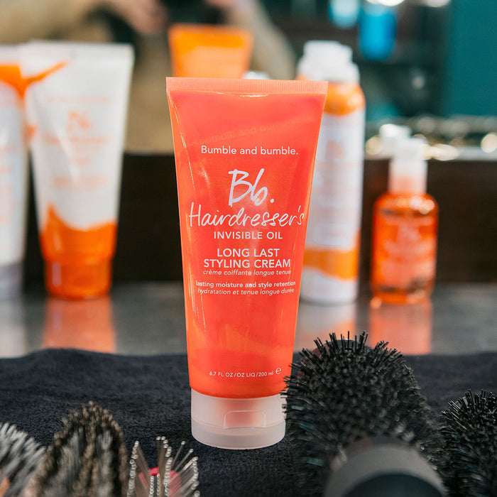 Lifestyle image of Bumble and Bumble Hairdresser's Invisible Oil Long Last Hydrating Hair Styling Cream  variant: 6.7 fl oz