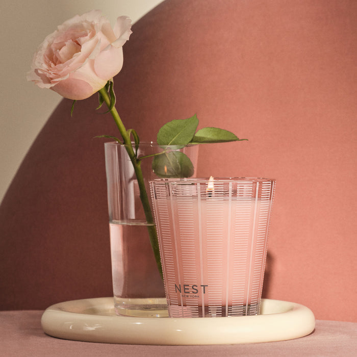 Lifestyle image of Nest Himalayan Salt & Rosewater Candle variant: 8.1 oz (Classic)