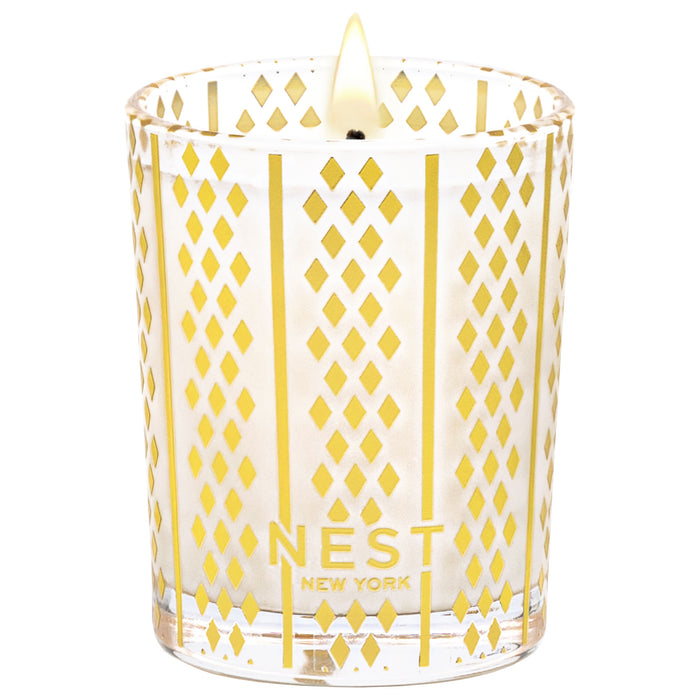 Lifestyle image of Nest Holiday Votive Ornament Candle (Limited Edition)