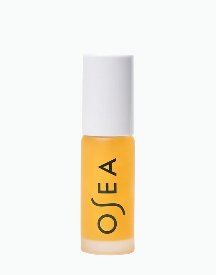 OSEA lip oil bottle on white background for ecommerce display