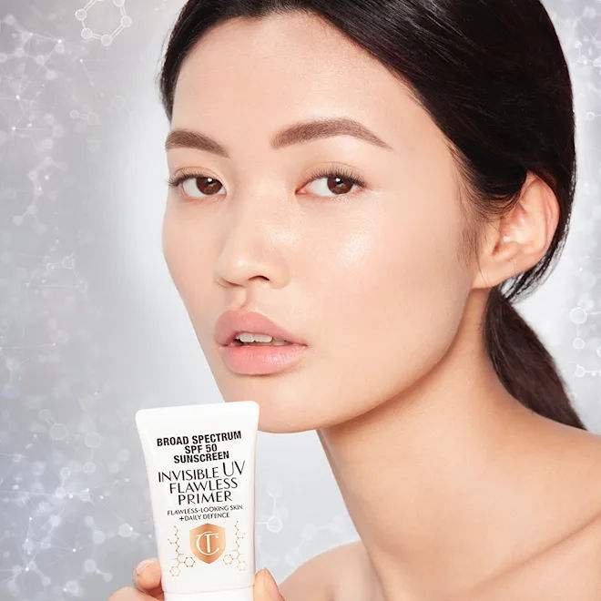 Model image of Charlotte Tilbury Invisible UV Flawless Poreless Primer SPF 50 variant: 1 oz