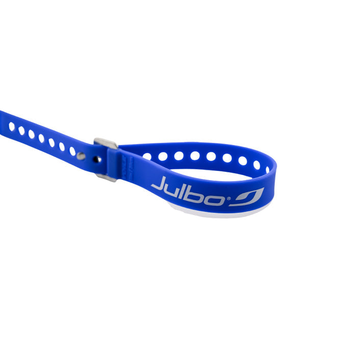 A blue silicone wristband with a silver metal buckle and a white Julbo logo printed on the front, shown against a plain white background. #color_deep-blue