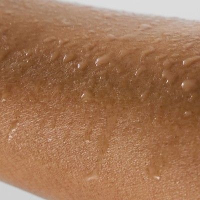 An arm swatch of Alo Magnesium Reset Spray