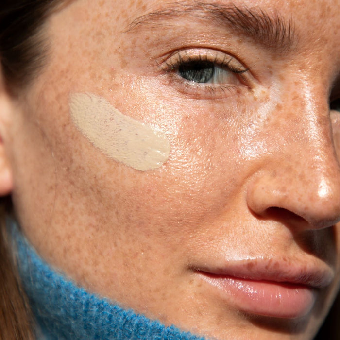 Model image of Unsun Mineral Tinted Face Sunscreen Lotion SPF 30 variant: Light/Medium