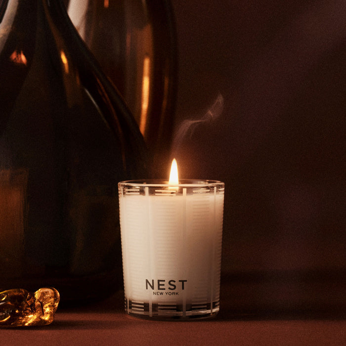 Lifestyle image of Nest Moroccan Amber Candle variant: 2 oz (Votive)