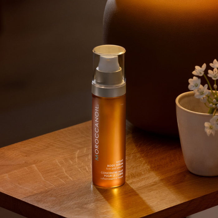 Lifestyle image of Moroccanoil Night Body Serum variant: 3.4 fl oz