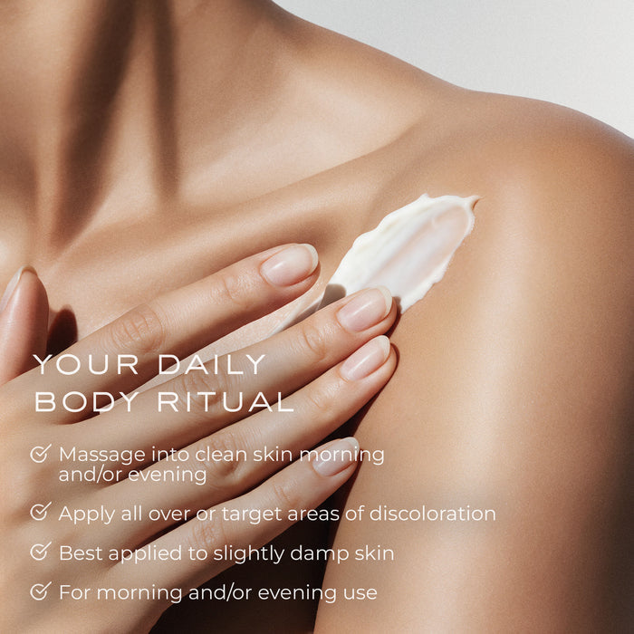 An arm swatch of Element Eight O2 Tranexamic Acid Depigment Nourish Body Cream