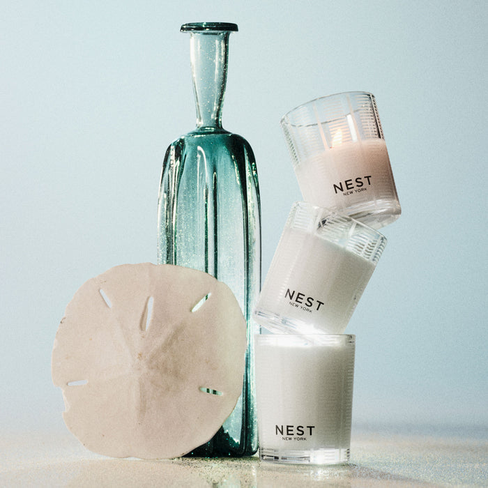 Lifestyle image of Nest Ocean Mist & Sea Salt Candle variant: 2 oz (Votive)