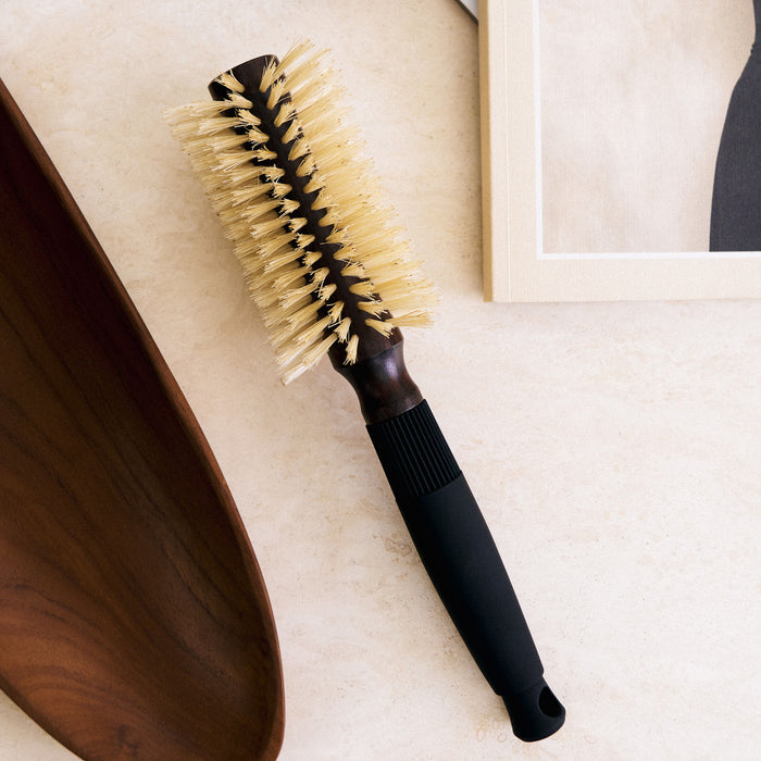 Lifestyle image of Christophe Robin Pre-Curved Blowdry Hairbrush