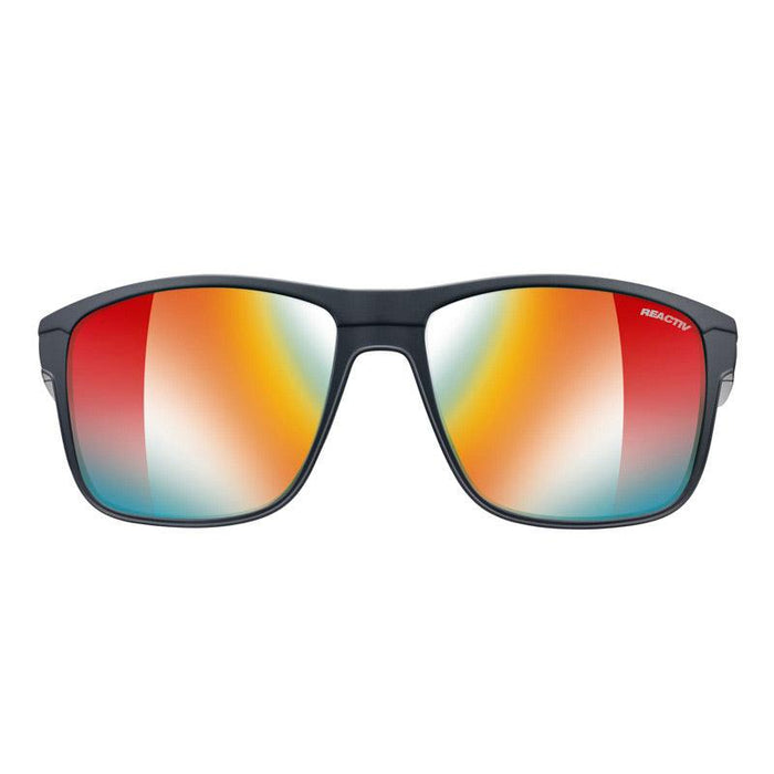 Julbo Eyewear Renegade Sunglasses Parts feature black rectangular frames and mirrored, multicolored replacement lenses in orange, yellow, blue, and red. Sleek, sturdy temple arms are displayed against a white background. #color_renegade-reactiv1-3-light-amplifier-lens-yellowred-flash