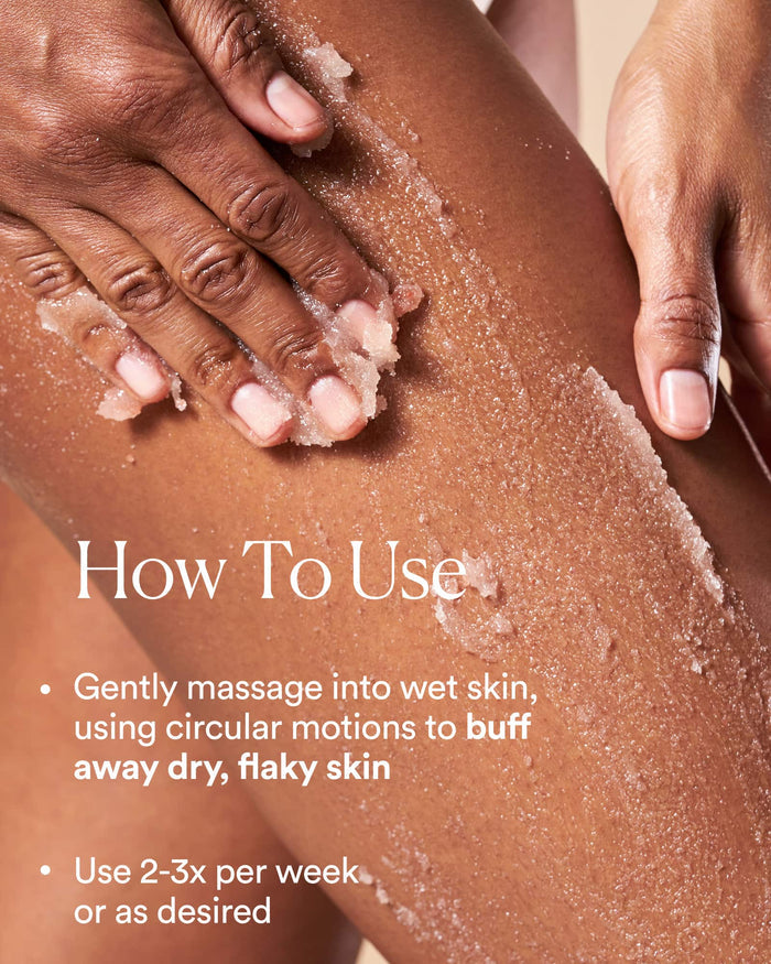 Close-up of hands using a exfoliating scrub on skin with text on how to use.