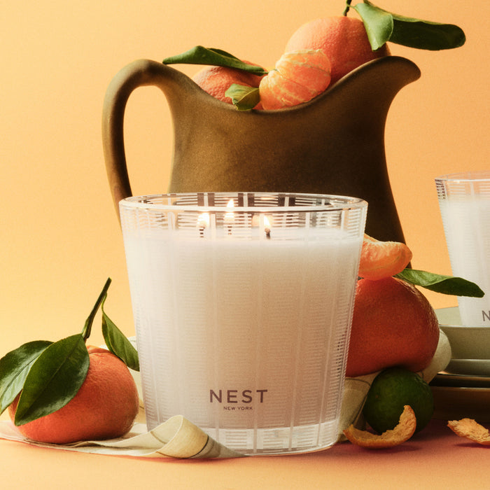 Lifestyle image of Nest Sicilian Tangerine Candle variant: 21.2 oz (3-Wick)