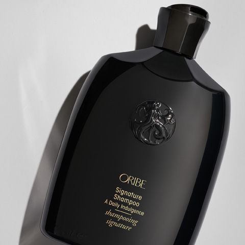 Image of an open Oribe Signature Shampoo variant: 8.5 fl oz