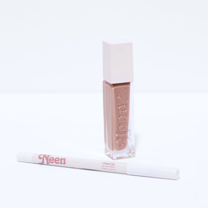 Image of a closed Neen Silicone Bag + Charms Lip Gloss and Liner Combo (Limited Edition) variant: Spring and Malt