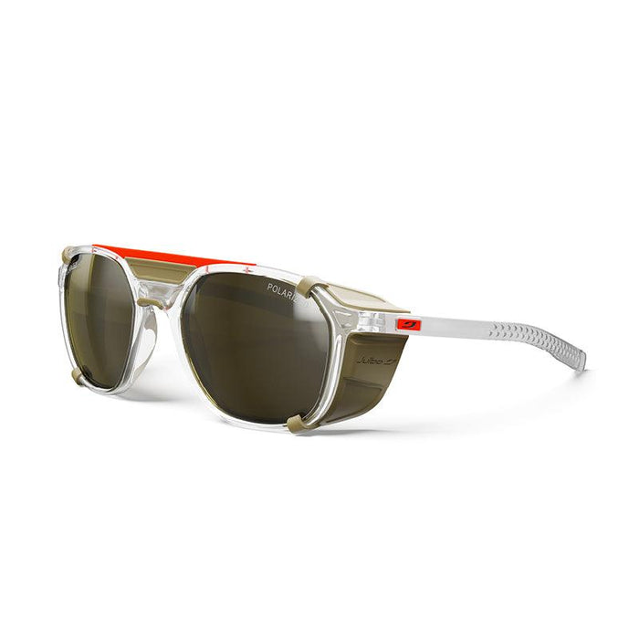 The Julbo Eyewear Slack Cover sunglasses feature clear frames, a polarized lens with dark tint, red accents on top, and beige details on the nose bridge and arms. #color_crystal-brown-with-spectron-3-polarized-lens