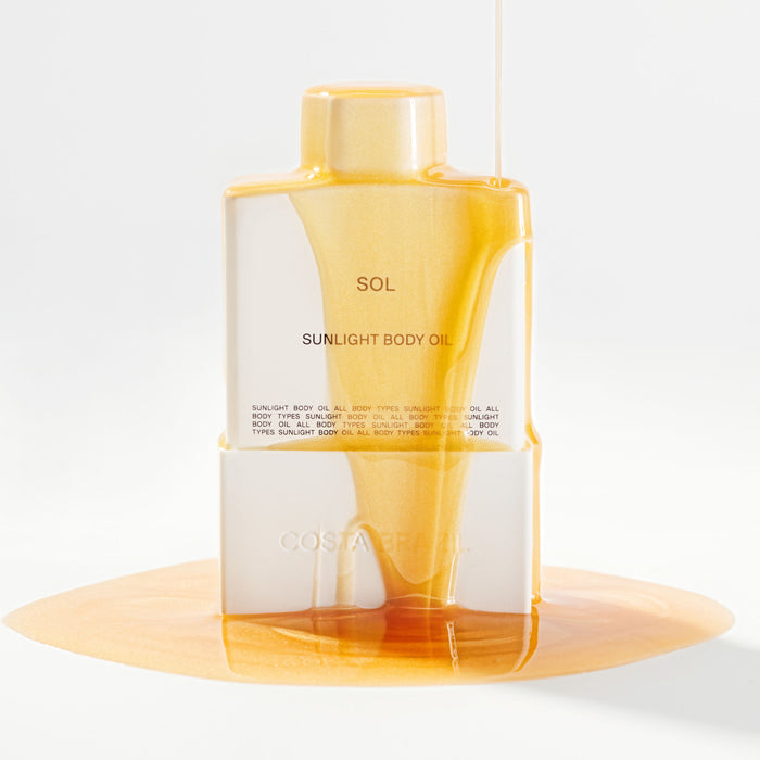 Lifestyle image of Costa Brazil Sol Sunlight Body Oil variant: 3.4 oz