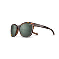Julbo-usa Spark women’s sunglasses with tortoiseshell thick round frames and green photochromic lenses, shown on a white background. #color_tortoise-brown-with-spectron-3-polarized-lens