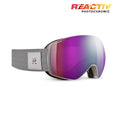 A pair of JBLX snow goggles with a gray strap and a purple-to-blue mirrored lens, shown on a white background with a 'REACTIV PHOTOCHROMIC' logo in the top right corner. #color_gray-with-reactiv-0-4-high-contrast-lens