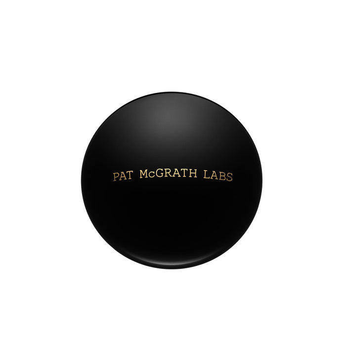 Image of a closed Pat McGrath Labs Sublime Perfection Blurring Under Eye Powder variant: Yellow