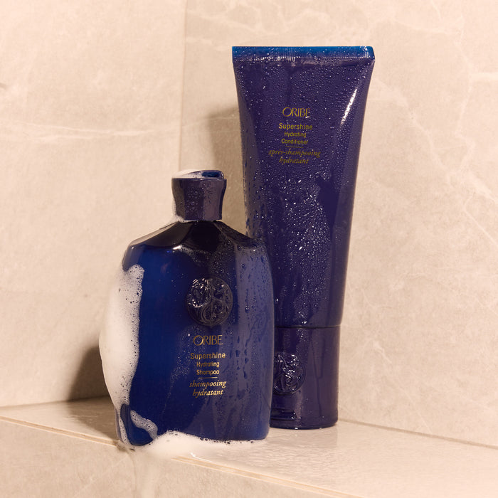 Lifestyle image of Oribe Supershine Hydrating Shampoo variant: 2.5 fl oz