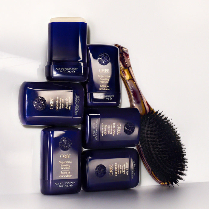 Lifestyle image of Oribe Supershine Smoothing Wax Styling Stick