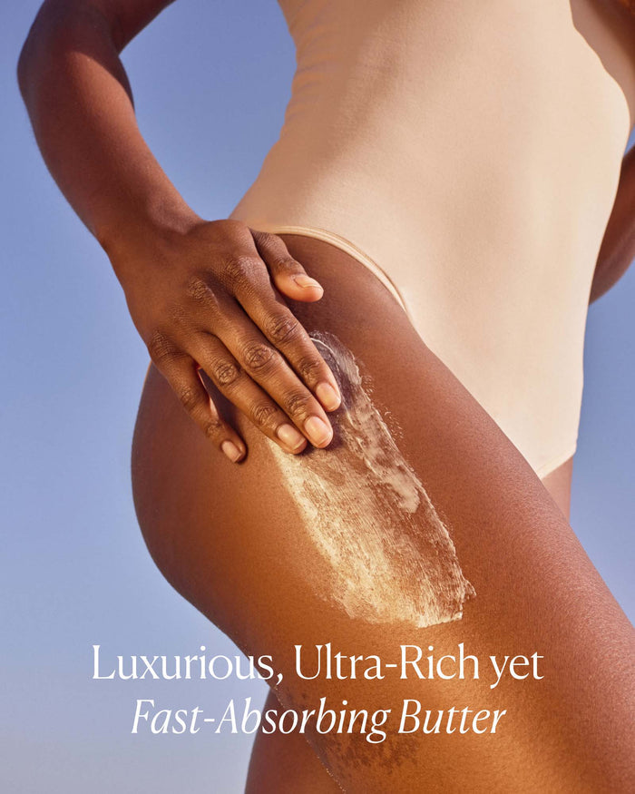 Ultra-rich body butter applied to thigh demonstrating fast-absorbing, nourishing texture