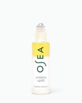 A bottle of OSEA Undaria Uplift fragrance mood oil with a yellow-to-clear gradient label and a clear rollerball cap, centered on a white background.