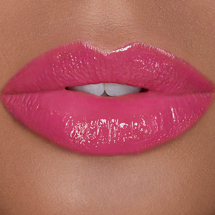 Model image of Hourglass Unreal High Shine Volumizing Lip Gloss variant: Fever