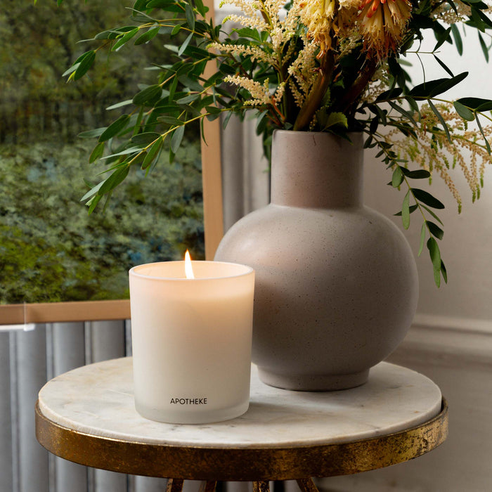 Lifestyle image of Apotheke White Vetiver Classic Scented Candle